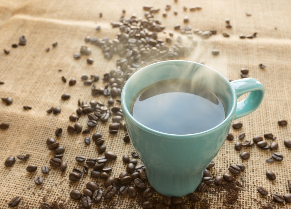 Kaffeetasse mit Kaffeebohnen